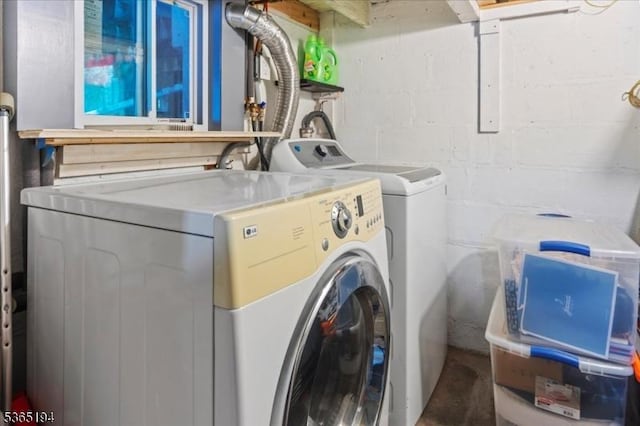 93 Garside St, Newark City, NJ 07104 - laundry room with washer and dryer and concrete block wall