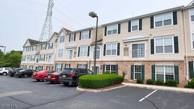 228 Windmill Ct, Lopatcong Twp, NJ 08865 - view of building exterior with uncovered parking