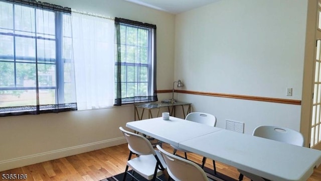 228 Windmill Ct, Lopatcong Twp, NJ 08865 - dining space featuring wood finished floors and an office area