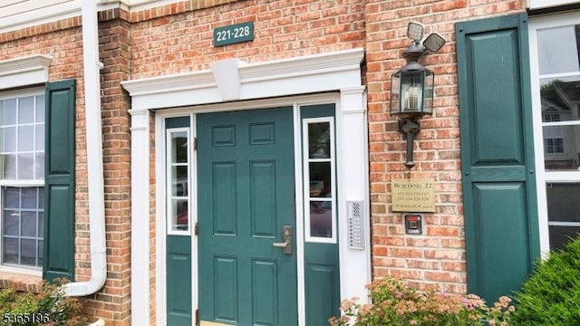 228 Windmill Ct, Lopatcong Twp, NJ 08865 - doorway to property with brick siding