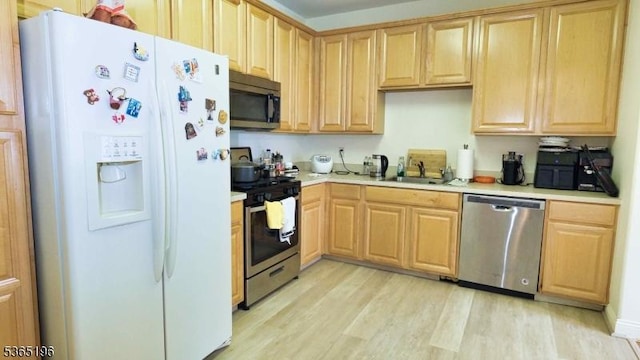 228 Windmill Ct, Lopatcong Twp, NJ 08865 - kitchen with stainless steel appliances and light brown cabinetry