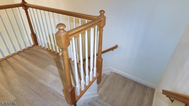 228 Windmill Ct, Lopatcong Twp, NJ 08865 - stairway featuring wood finished floors