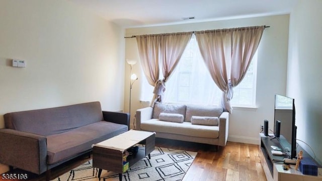 228 Windmill Ct, Lopatcong Twp, NJ 08865 - living room featuring light wood-type flooring and baseboards