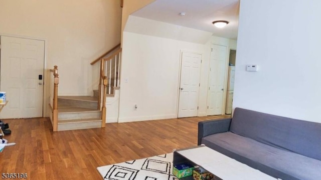 228 Windmill Ct, Lopatcong Twp, NJ 08865 - living area with stairway and wood finished floors