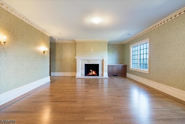 11 Margo Way, Alpine Boro, NJ 07620 - unfurnished living room featuring wallpapered walls, wood finished floors, a high end fireplace, and crown molding