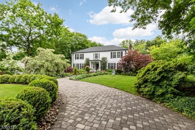 95 Green Ave, Madison Boro, NJ 07940 - colonial-style house featuring a chimney and a front lawn
