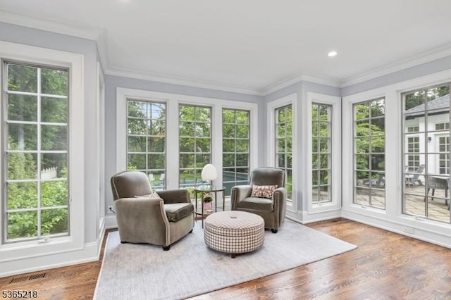 95 Green Ave, Madison Boro, NJ 07940 - sunroom with plenty of natural light, wood finished floors, ornamental molding, and recessed lighting