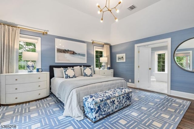 95 Green Ave, Madison Boro, NJ 07940 - bedroom with a chandelier, multiple windows, and wood finished floors