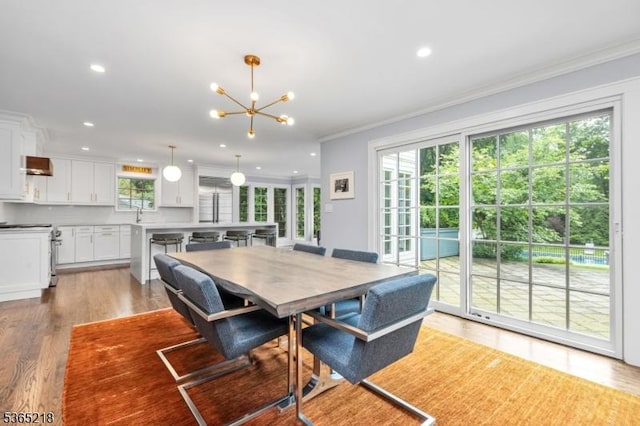 95 Green Ave, Madison Boro, NJ 07940 - dining area with ornamental molding, a chandelier, light wood-type flooring, and recessed lighting