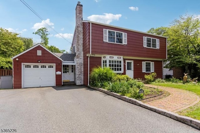 2538 Mountain Ave, Scotch Plains Twp, NJ 07076 - colonial home with an attached garage, a chimney, and driveway