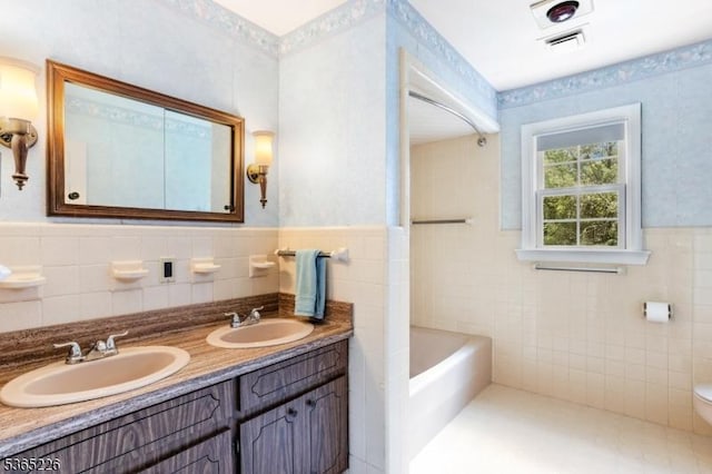 2538 Mountain Ave, Scotch Plains Twp, NJ 07076 - full bath with a bath, double vanity, wainscoting, and tile walls