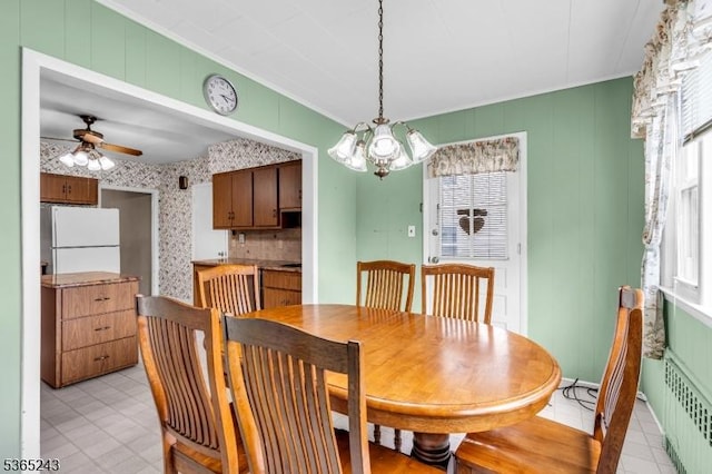 13 S St, Madison Boro, NJ 07940 - dining space featuring radiator, healthy amount of natural light, ceiling fan, a chandelier, and ornamental molding
