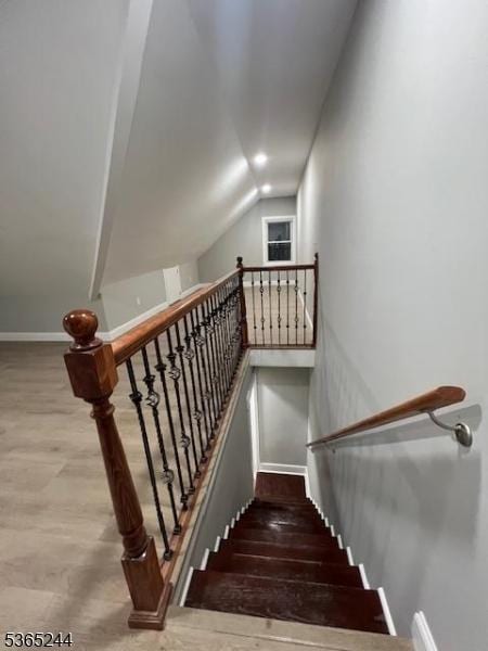 14 Guenther Pl, Passaic City, NJ 07055 - staircase featuring vaulted ceiling and baseboards