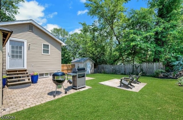 67 Riverview Ave, Lincoln Park Boro, NJ 07035 - fenced backyard with entry steps, a patio, and a shed