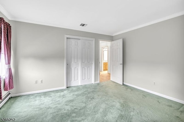 23 Estate Dr, Wantage Twp, NJ 07461 - unfurnished bedroom featuring carpet flooring, crown molding, baseboard heating, and a closet