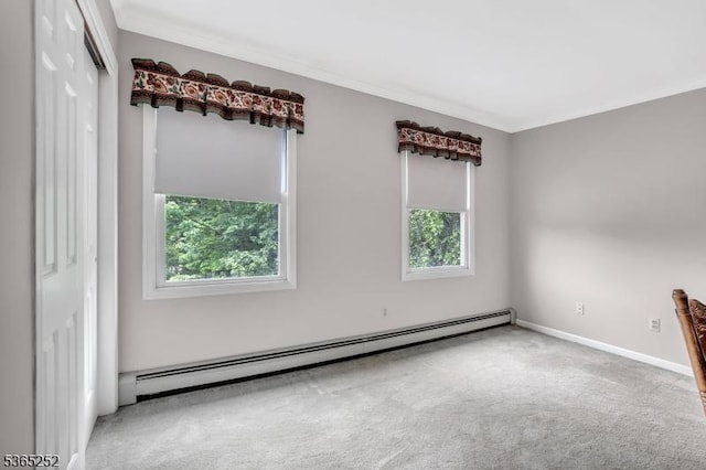 23 Estate Dr, Wantage Twp, NJ 07461 - spare room featuring a baseboard heating unit, carpet floors, and ornamental molding