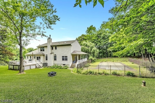 23 Estate Dr, Wantage Twp, NJ 07461 - rear view of house with a chimney, a fenced backyard, a deck, and crawl space