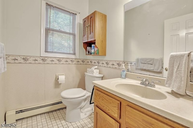 23 Estate Dr, Wantage Twp, NJ 07461 - bathroom with a baseboard radiator, vanity, a wainscoted wall, and tile patterned flooring