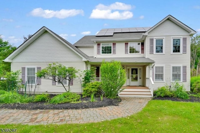 8 Dahn Dr, Sparta Twp, NJ 07871 - victorian-style house with solar panels and a porch