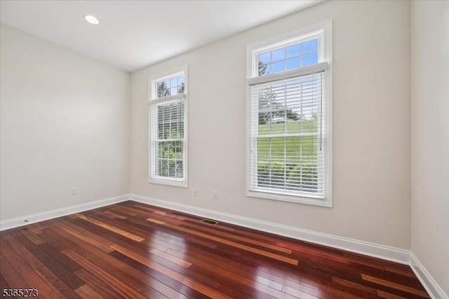 7 Sycamore Dr, Chatham Twp, NJ 07928 - unfurnished room with dark wood-type flooring