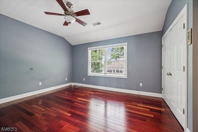 7 Sycamore Dr, Chatham Twp, NJ 07928 - unfurnished bedroom with lofted ceiling, hardwood / wood-style floors, and a ceiling fan