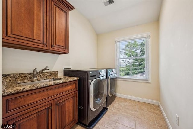 7 Sycamore Dr, Chatham Twp, NJ 07928 - laundry area featuring cabinet space, independent washer and dryer, and light tile patterned floors