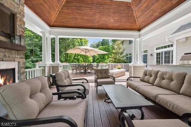 7 Sycamore Dr, Chatham Twp, NJ 07928 - deck featuring an outdoor living space with a fireplace and outdoor dining space