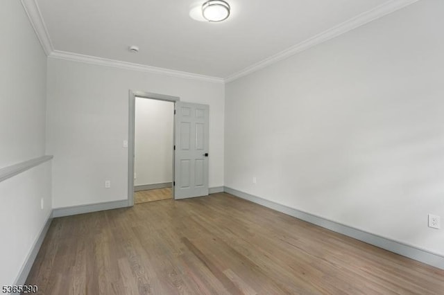 126 Cooney Ave, Hamilton Twp, NJ 08619 - empty room with crown molding, wood finished floors, and a smoke detector