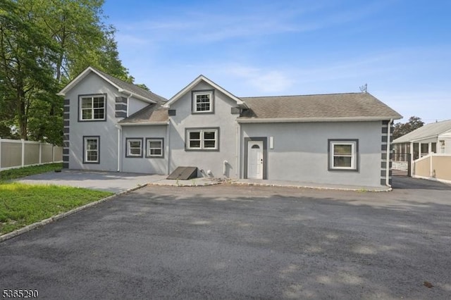 126 Cooney Ave, Hamilton Twp, NJ 08619 - traditional-style house featuring stucco siding and a patio