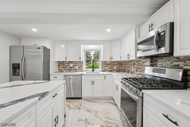 126 Cooney Ave, Hamilton Twp, NJ 08619 - kitchen featuring appliances with stainless steel finishes, light marble finish flooring, recessed lighting, light stone counters, and tasteful backsplash