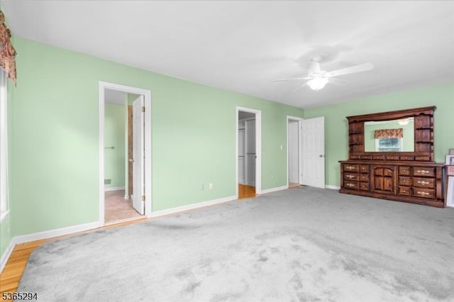 10 Duke Ct, Franklin Twp, NJ 08867 - unfurnished bedroom featuring carpet flooring, a spacious closet, and a ceiling fan