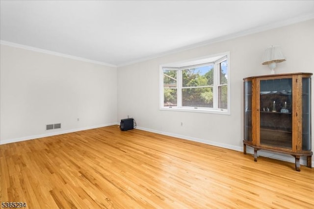 10 Duke Ct, Franklin Twp, NJ 08867 - spare room featuring light wood-type flooring and ornamental molding