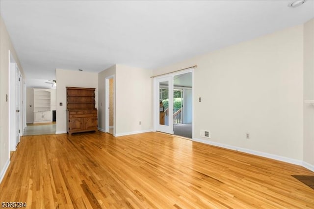 10 Duke Ct, Franklin Twp, NJ 08867 - unfurnished living room with light wood finished floors and ceiling fan
