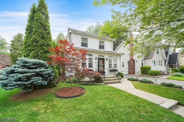 103 Cedar St, Nutley Twp, NJ 07110 - view of front of home with a front lawn