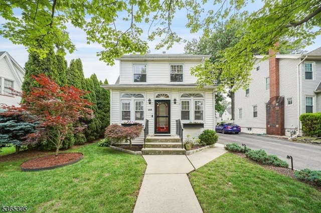 103 Cedar St, Nutley Twp, NJ 07110 - view of front of home featuring a front lawn