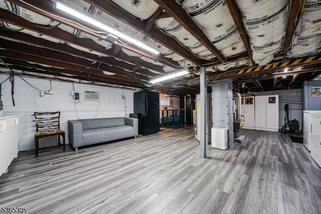 103 Cedar St, Nutley Twp, NJ 07110 - unfinished below grade area featuring wood finished floors and washer / dryer