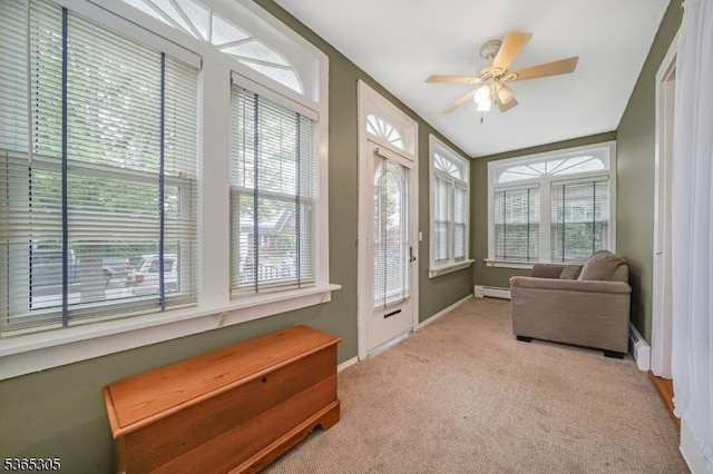 103 Cedar St, Nutley Twp, NJ 07110 - sunroom / solarium with a baseboard radiator, plenty of natural light, and carpet