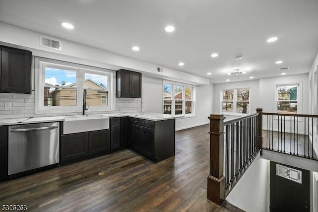 613 S 18th St, Newark City, NJ 07103 - kitchen featuring dishwasher, dark wood-style floors, recessed lighting, decorative backsplash, and a peninsula