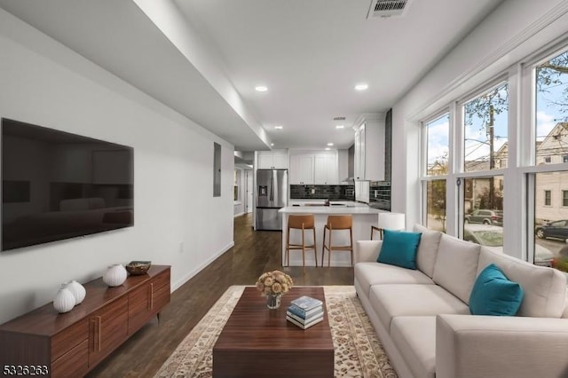 613 S 18th St, Newark City, NJ 07103 - living room featuring dark wood-style floors and recessed lighting