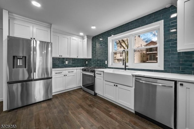 613 S 18th St, Newark City, NJ 07103 - kitchen with stainless steel appliances, dark wood-type flooring, white cabinets, backsplash, and recessed lighting
