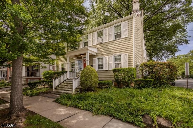 104 W Emerson Ave, Rahway City, NJ 07065 - view of front of house featuring a chimney