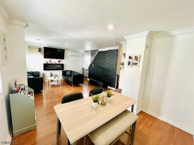 52 Sargeant Ave, Clifton City, NJ 07013 - dining area featuring crown molding, an AC wall unit, stairs, wood finished floors, and recessed lighting