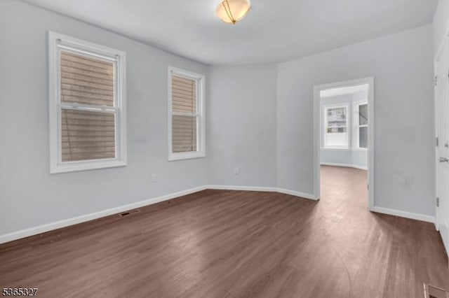 160 S 11th St, Newark City, NJ 07107 - empty room featuring wood finished floors and baseboards