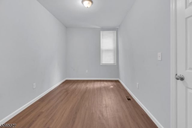 160 S 11th St, Newark City, NJ 07107 - empty room with wood finished floors and baseboards