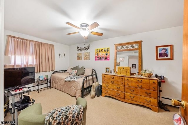 305 W Clay Ave, Roselle Park Boro, NJ 07204 - bedroom with a baseboard heating unit, carpet, and a ceiling fan
