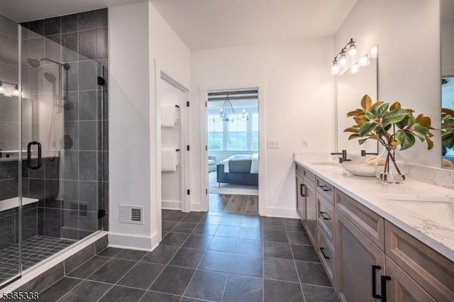 16 Whitaker Ln, Far Hills Boro, NJ 08873 - ensuite bathroom with double vanity, a stall shower, and tile patterned floors