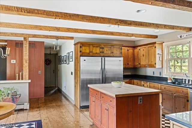 153 Lambertville Hq Rd, Delaware Twp, NJ 08559 - kitchen featuring built in refrigerator, a baseboard radiator, light wood finished floors, a kitchen island, and beam ceiling