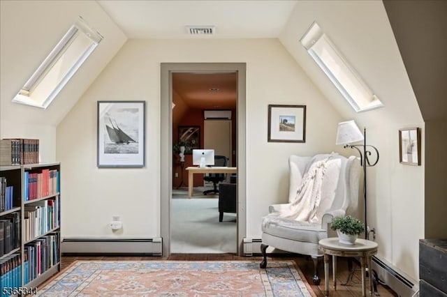 153 Lambertville Hq Rd, Delaware Twp, NJ 08559 - living area with a skylight, a baseboard heating unit, vaulted ceiling, and a desk