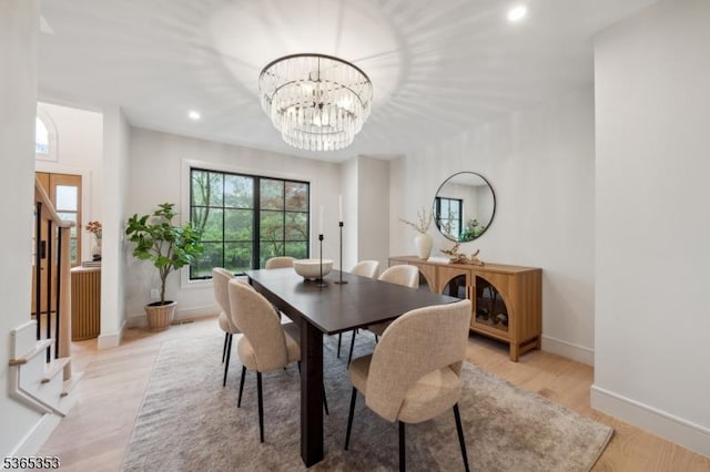 338 Old Short Hills Rd, Millburn Twp, NJ 07078 - dining space with light wood finished floors, recessed lighting, stairs, and a chandelier