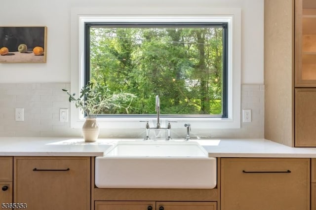 338 Old Short Hills Rd, Millburn Twp, NJ 07078 - kitchen with healthy amount of natural light, tasteful backsplash, and light countertops